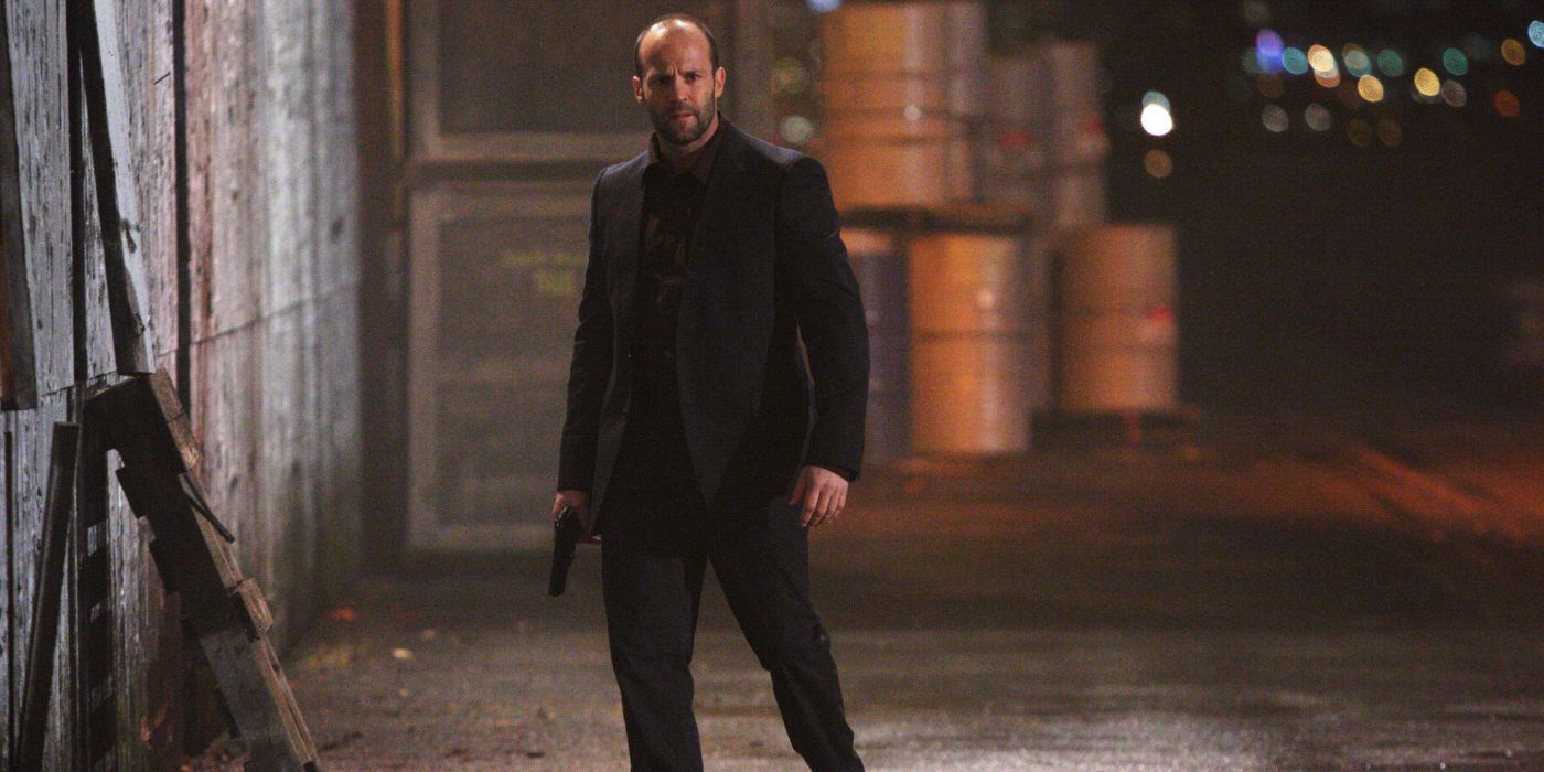 Crawford (Jason Statham) walking down a dark alley in War.