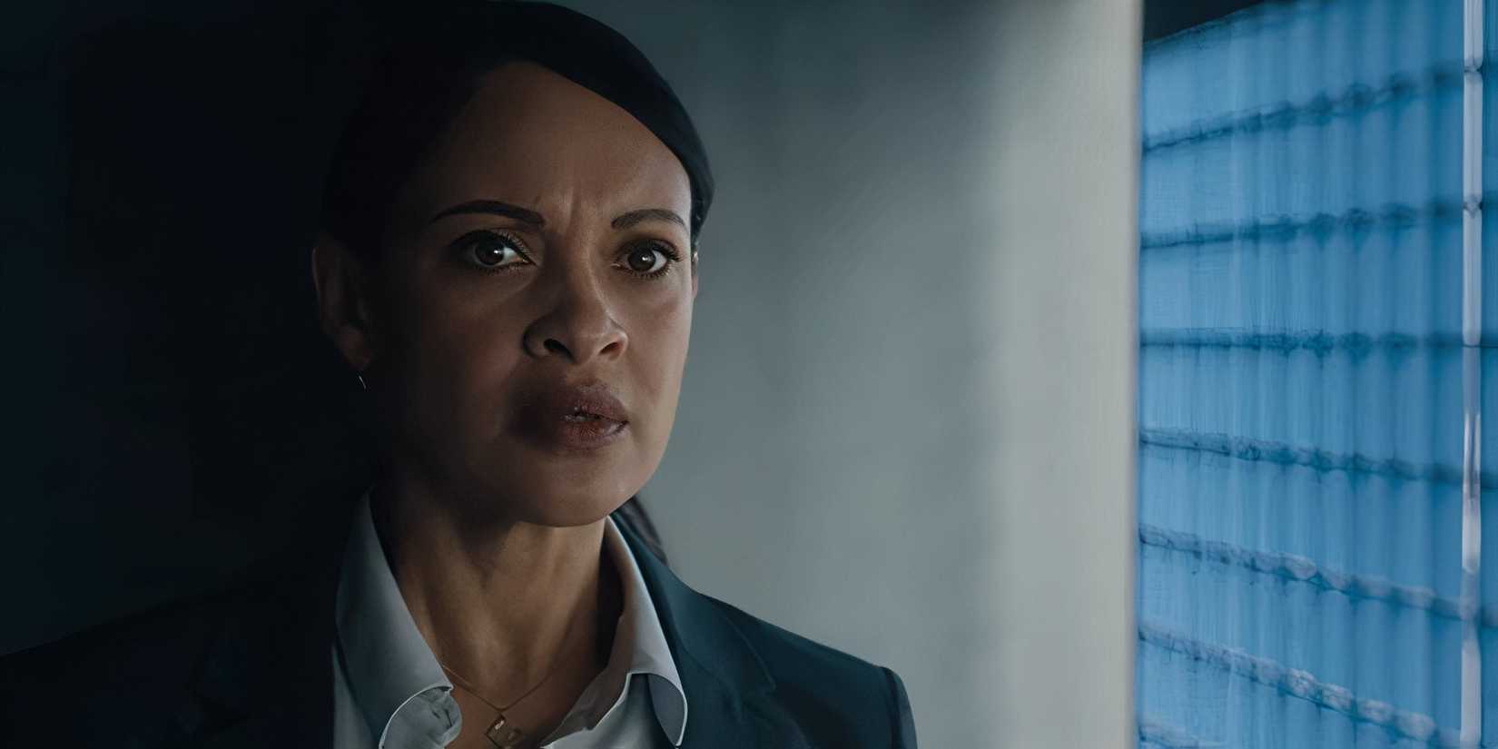 Cynthia Addai-Robinson as Marybeth looking worried in The Accountant 2