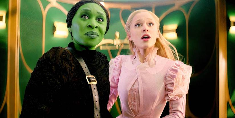 Cynthia Erivo as Elphaba and Ariana Grande as Glinda looking awed on the train in Wicked