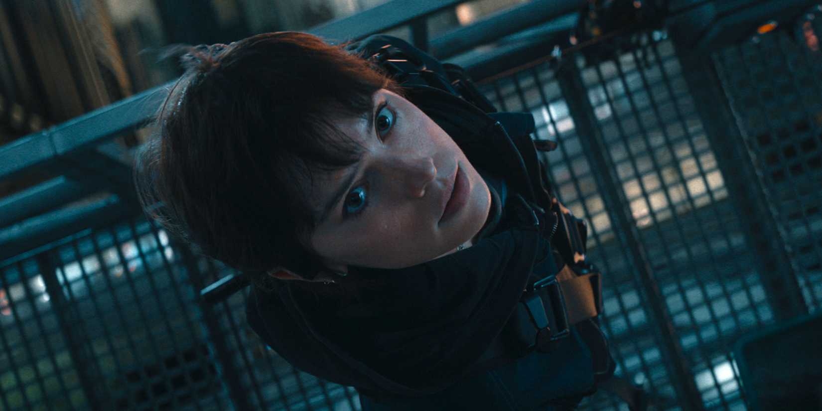 Daisy Ridley as Joey staring up into the camera in Cleaner