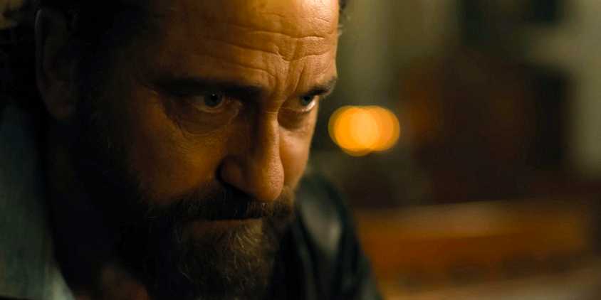 Big Nick (Gerard Butler) lost in his thoughts in Den of Thieves 2: Pantera