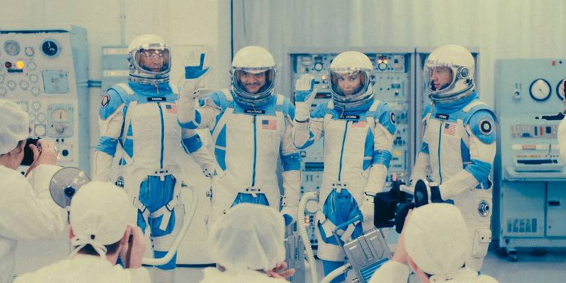 Ebon Moss-Bachrach's Ben Grimm, Vanessa Kirby's Sue Storm, Pedro Pascal's Reed Richards, and Joseph Quinn's Johnny Storm in their spacesuits in The Fantastic Four First Steps (2025)