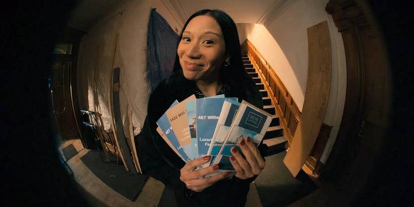 Elena Juatco as Clytemnestra Lomax with flyers in SurrealEstate