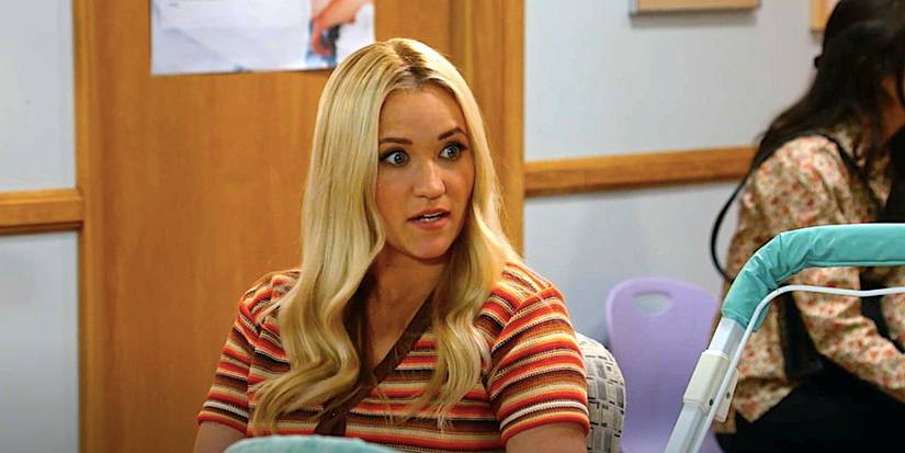 Emily Osment's Mandy looking surprised at a doctors office in Georgie & Mandy's First Marriage episode 8