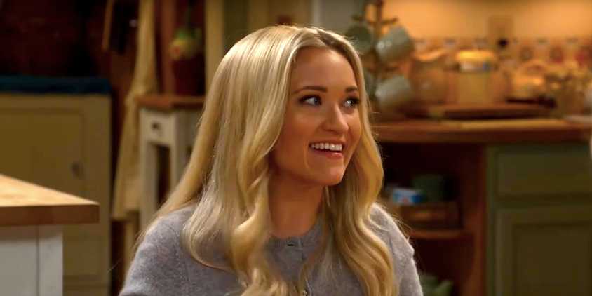 Emily Osment's Mandy smiles at the dinner table in Georgie & Mandy's First Marriage episode 11
