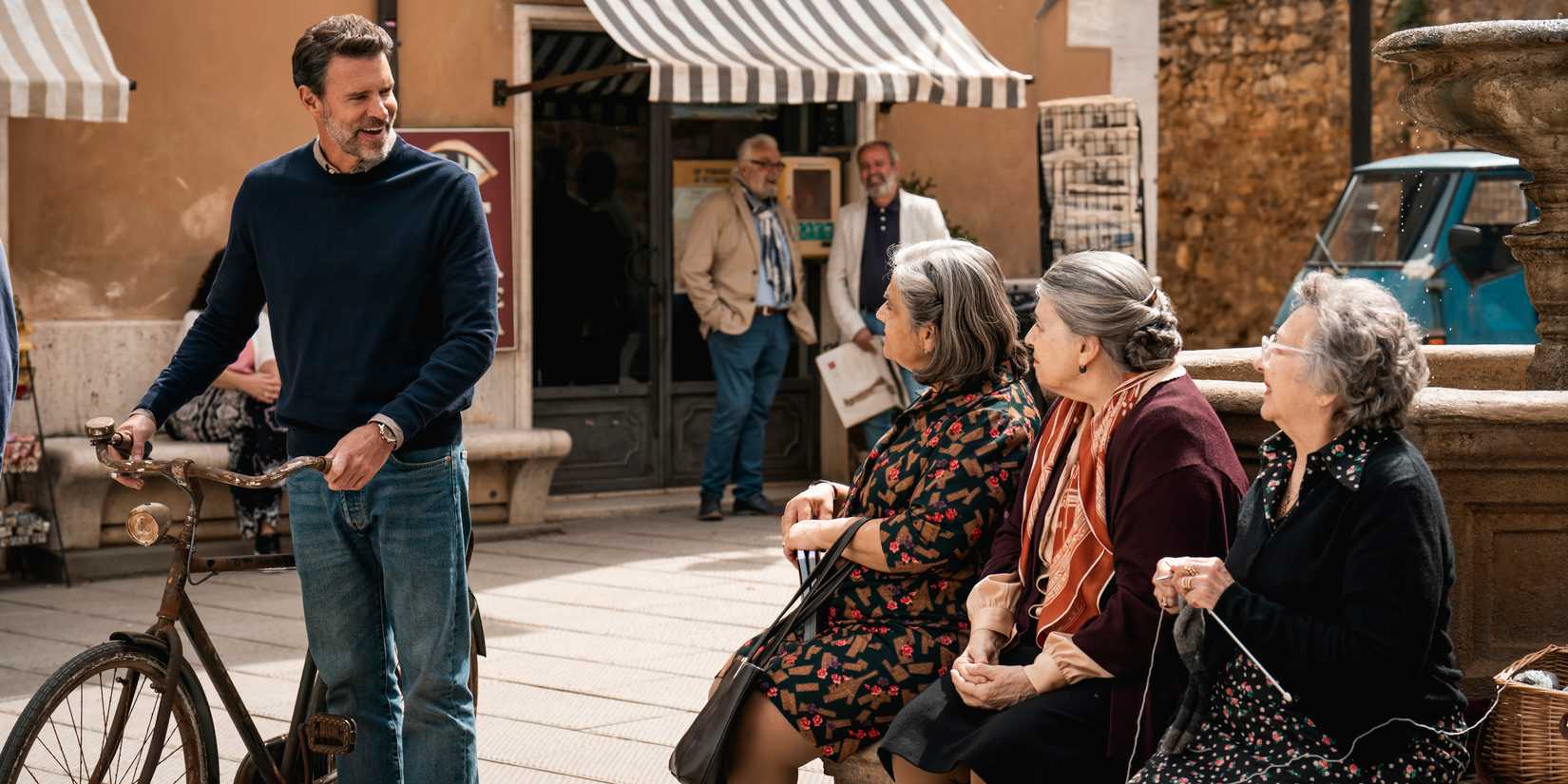 Eric chats with 3 women in La Dolce Villa