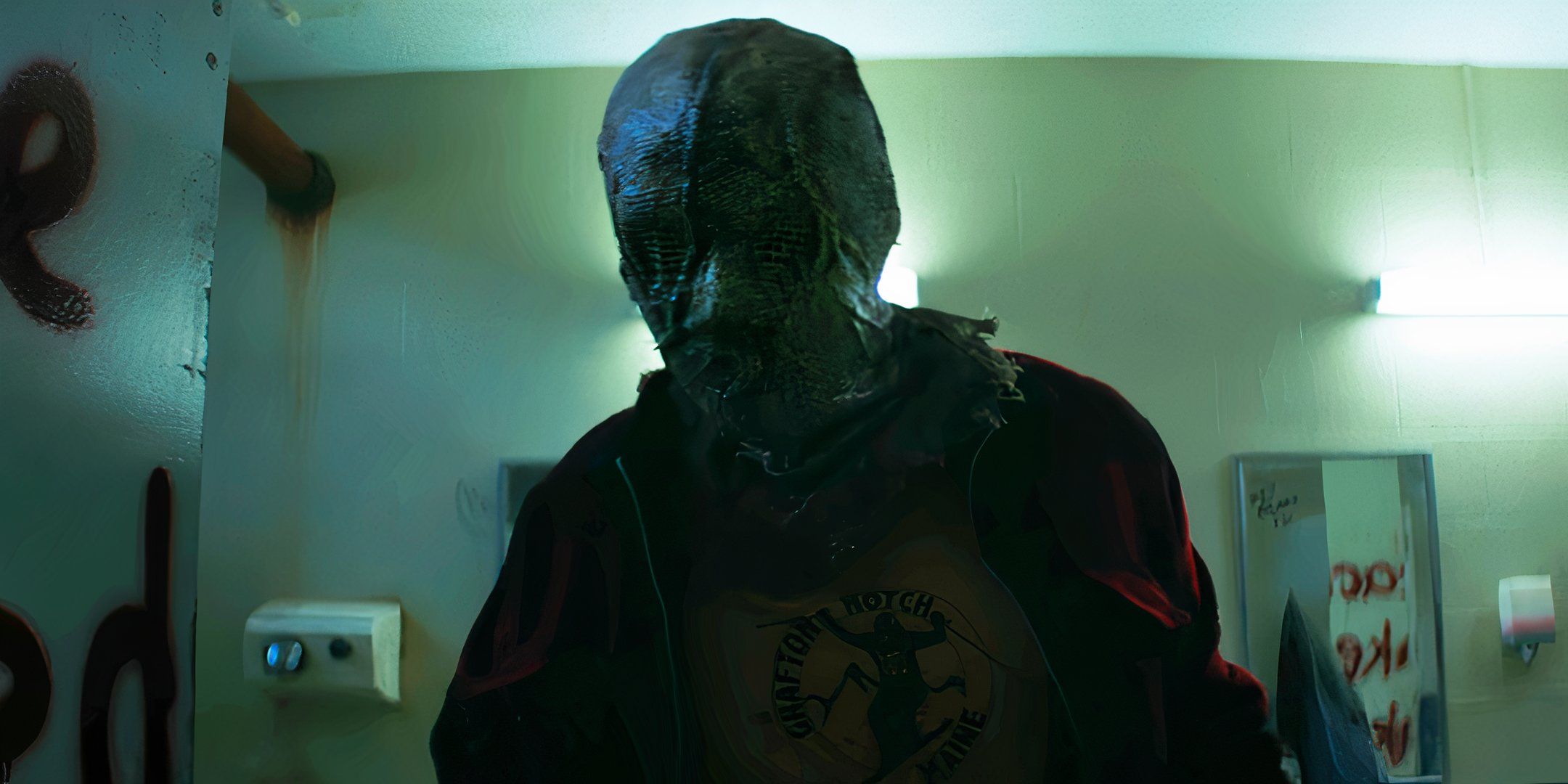 A masked killer looks into a bathroom stall in Fear Street Part One 1994
