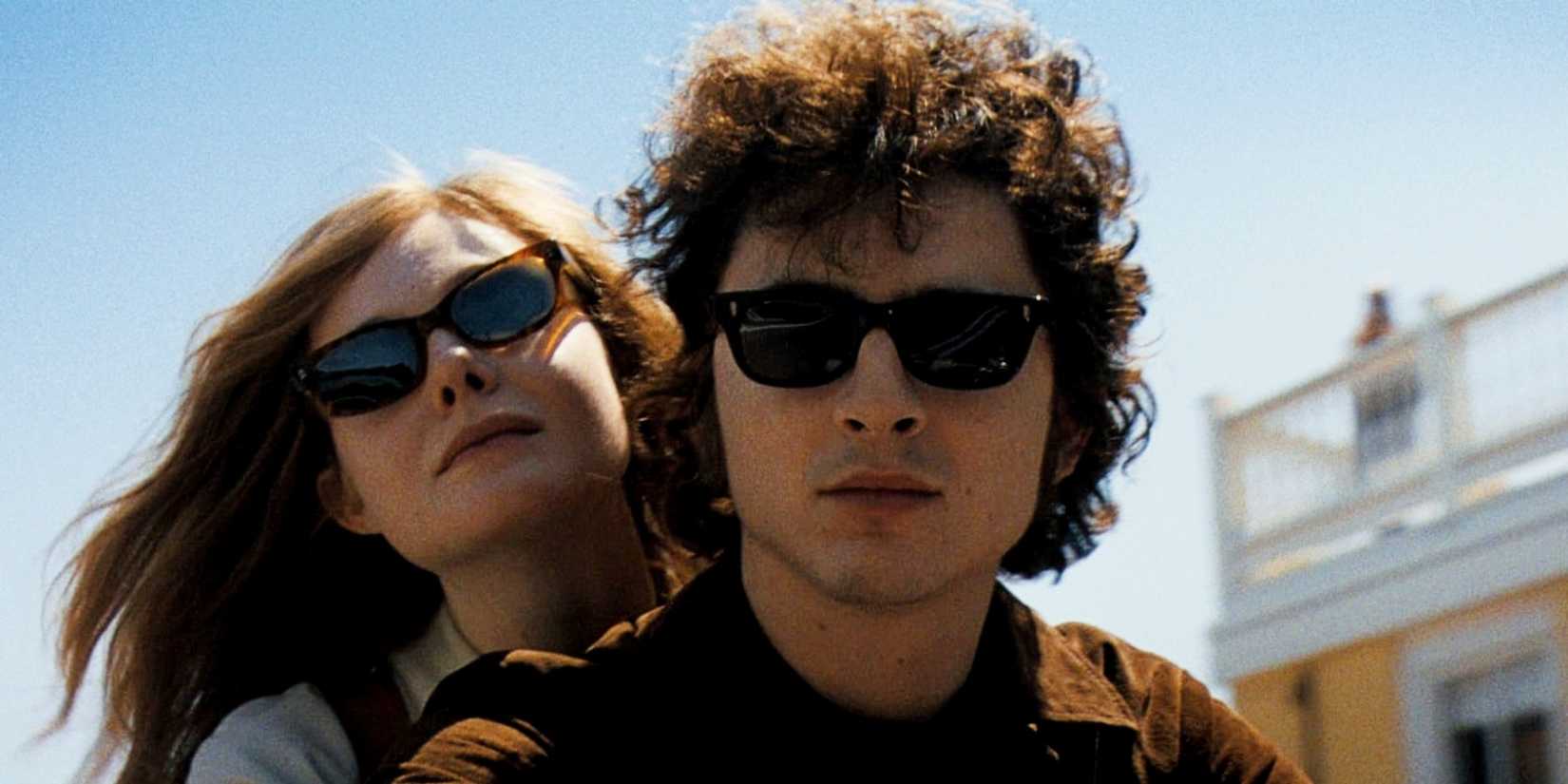 Timothée Chalamet as Bob Dylan and Elle Fanning as Sylvie Russo in A Complete Unknown (2024)