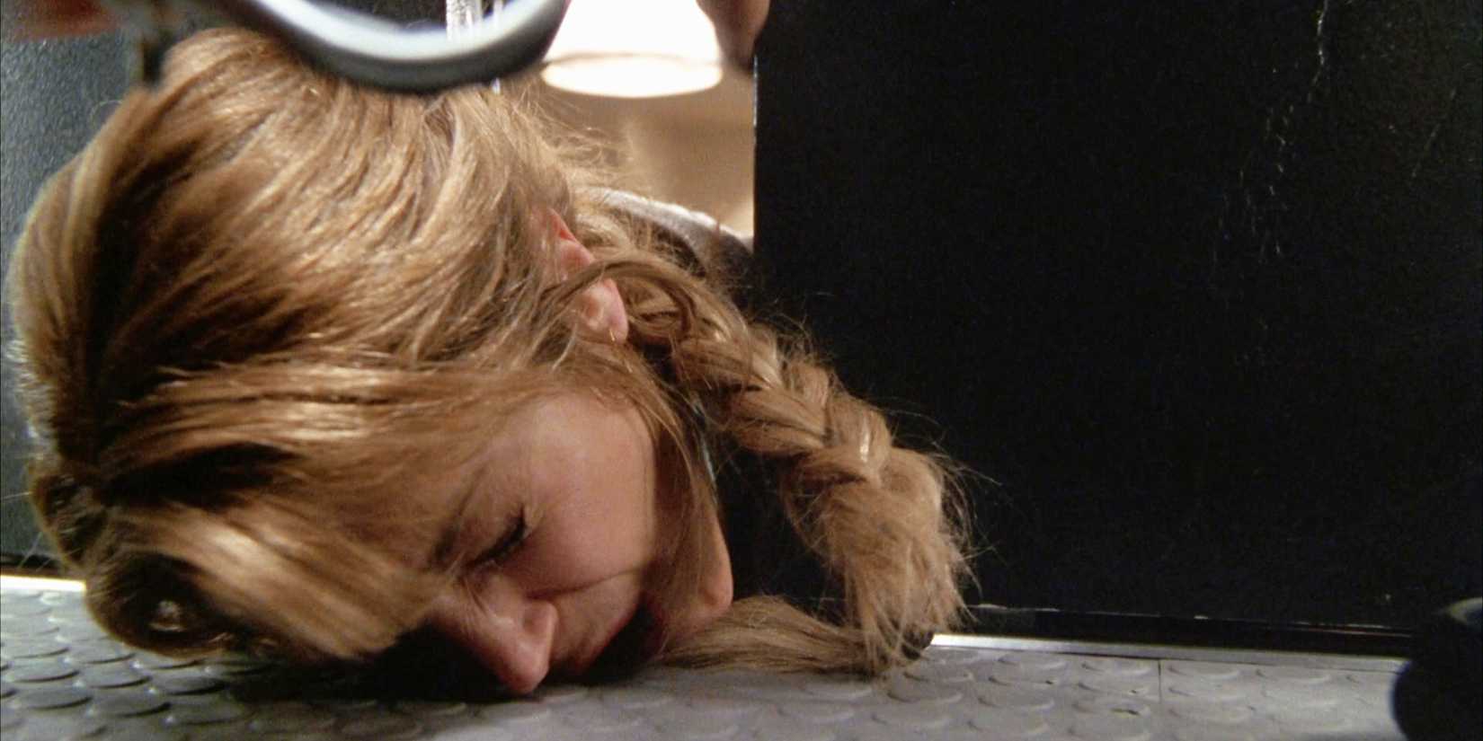 Final Destination 2 Nora's head trapped in an elevator