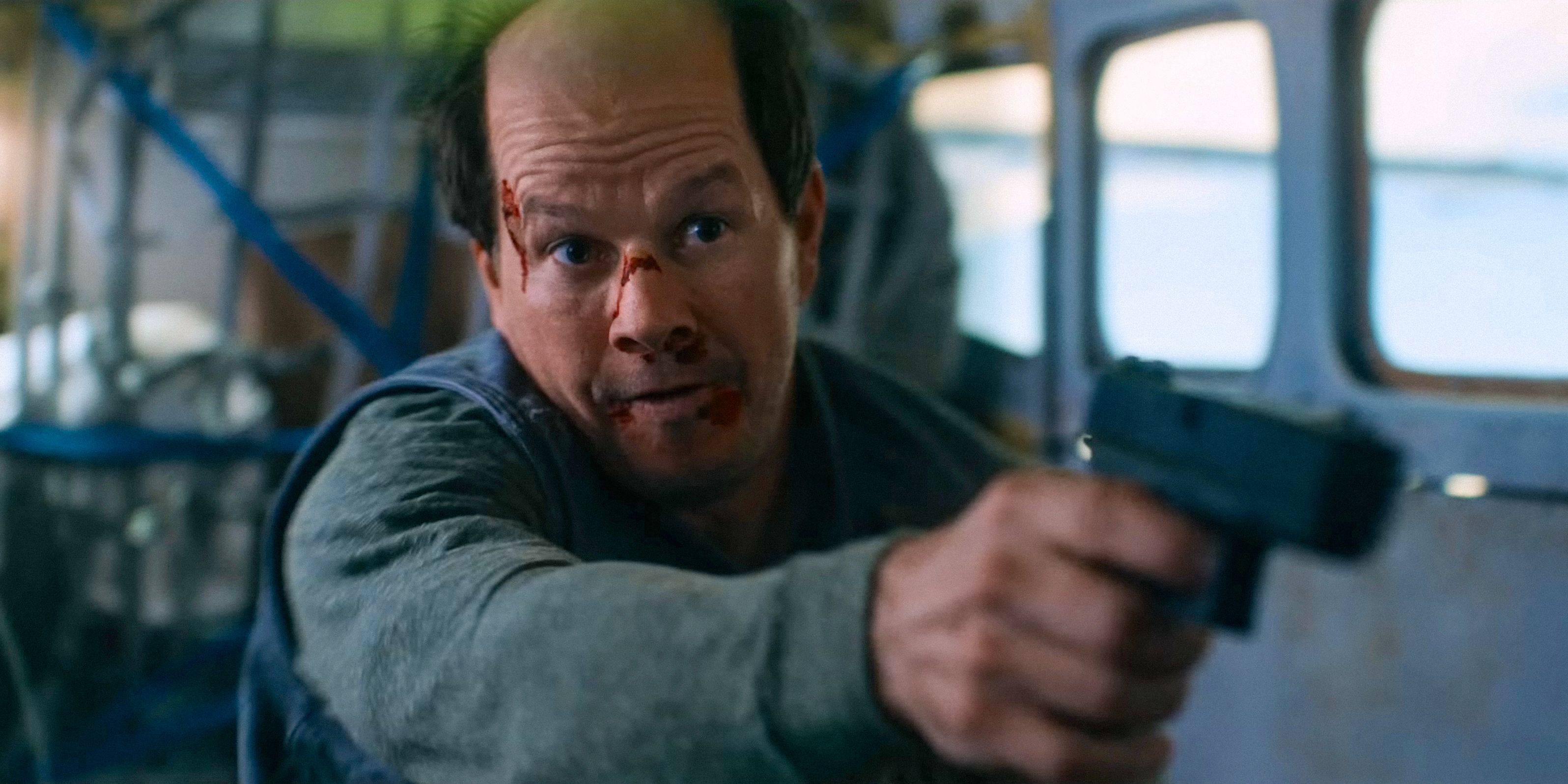 Daryl (Mark Wahlberg) looking completely insane while pointing a gun in Flight Risk