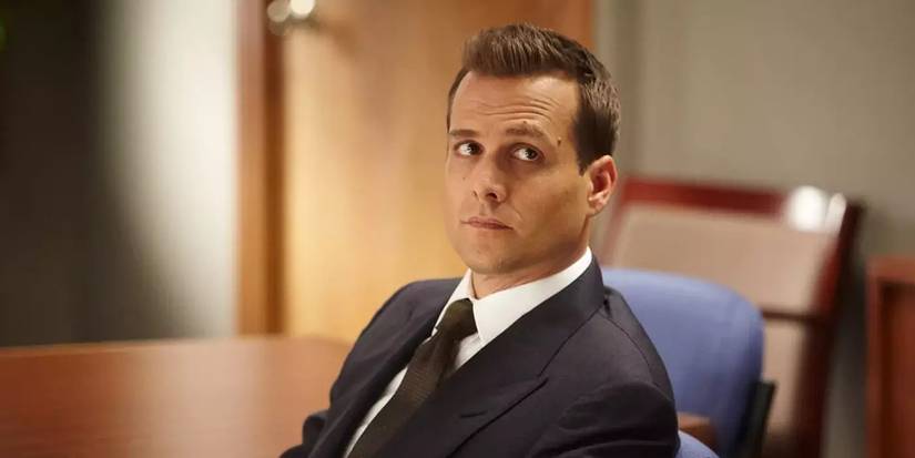Gabriel Macht as Harvey Specter looking upwards while sitting in Suits