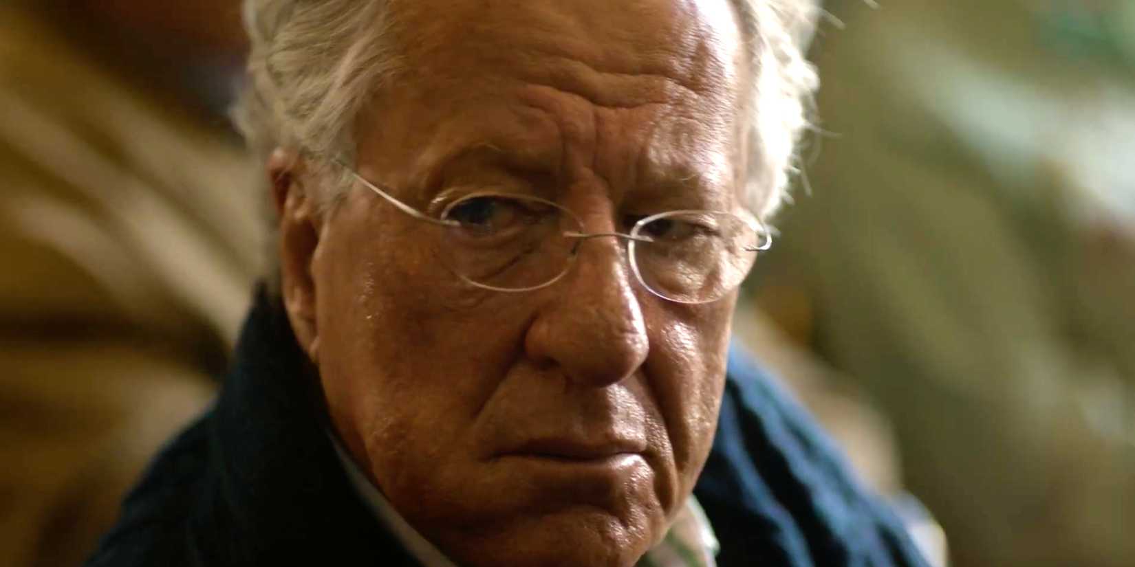 Geoffrey Rush in The Rule of Jenny Pen in a close up, looking concerned