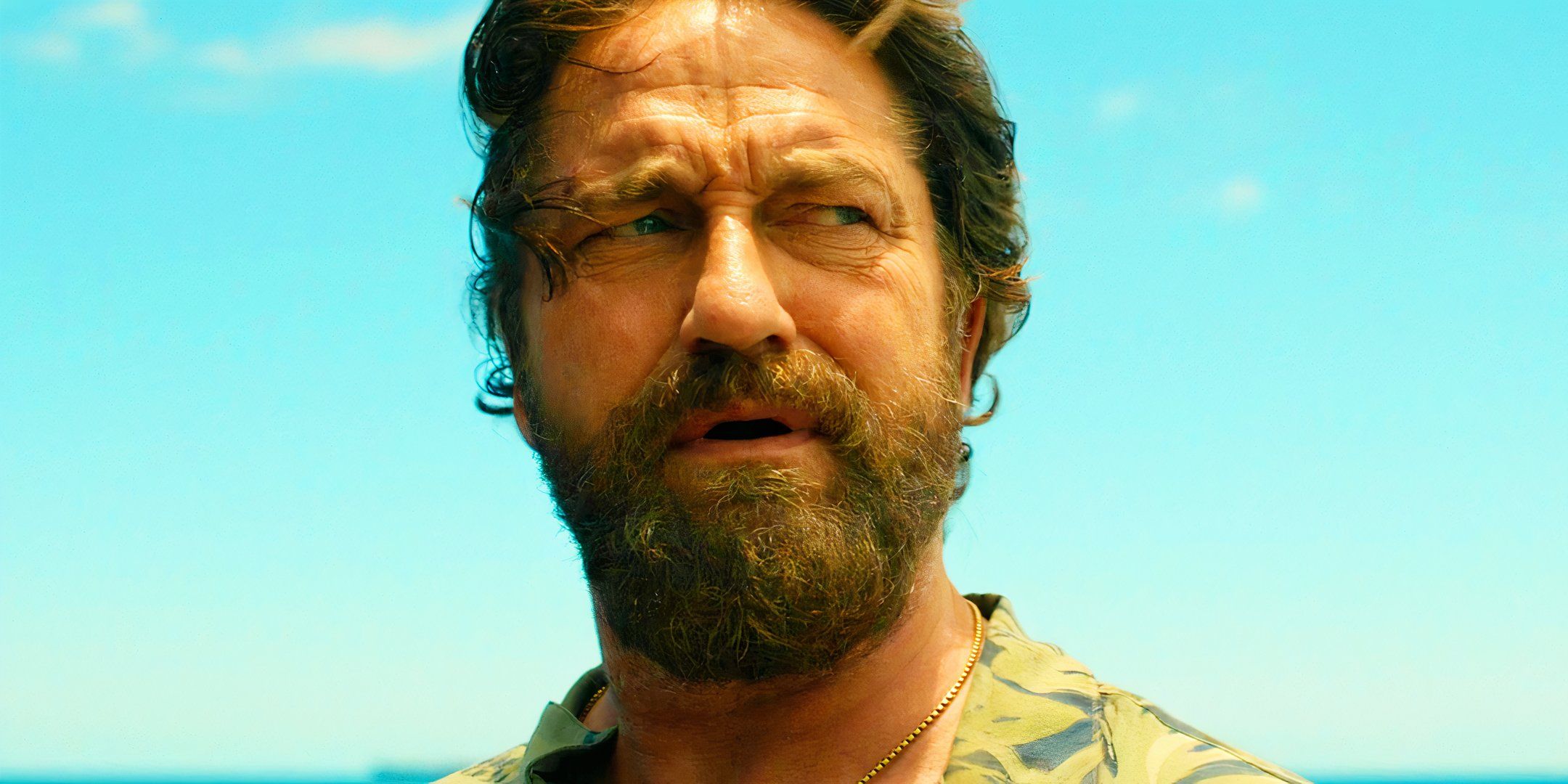 Gerard Butler looking to one side as Big Nick in Den of Thieves 2 Pantera