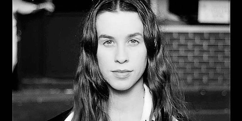 Head shot of Alanis Morissette from her Hand in my pocket video
