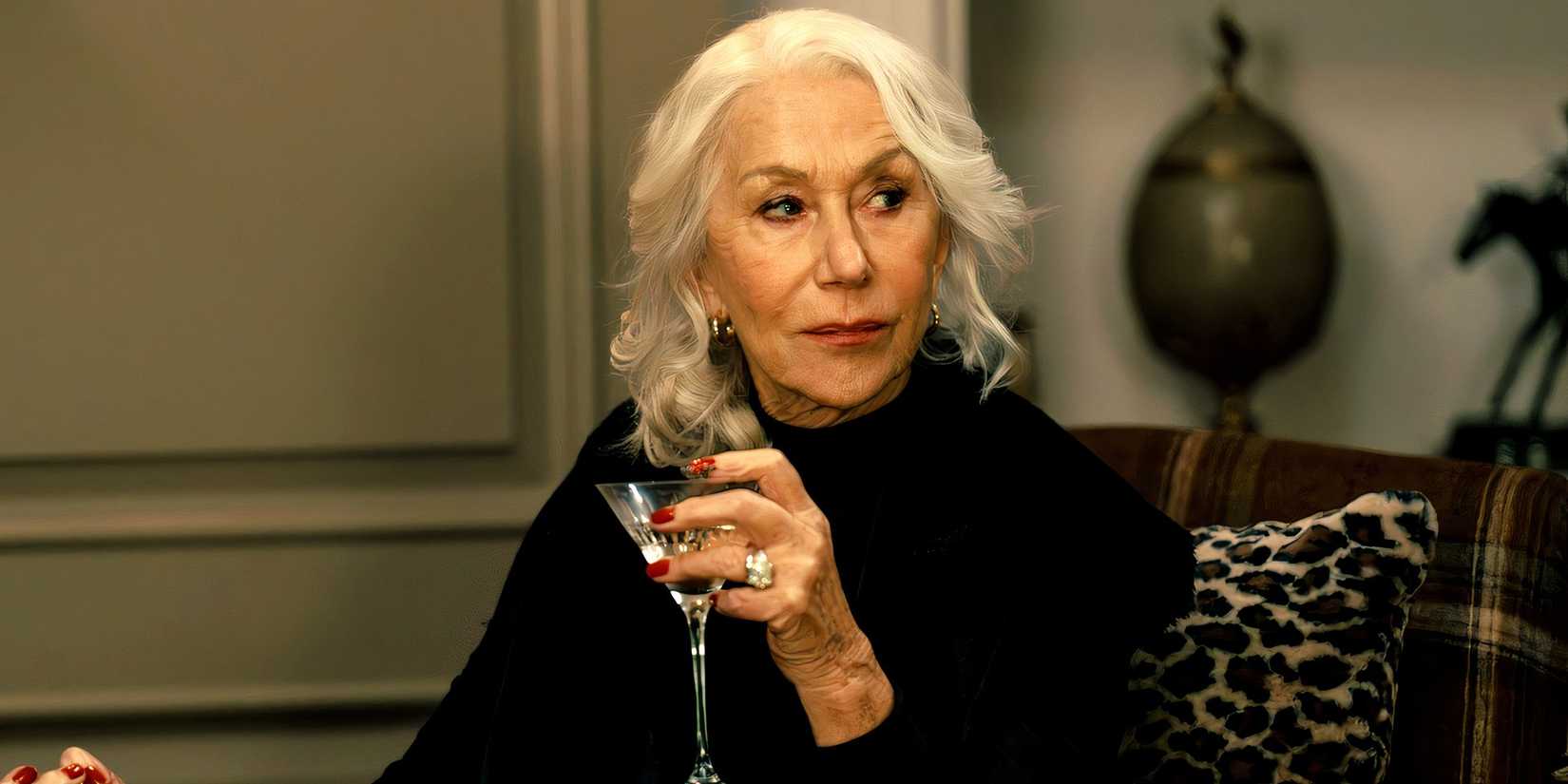 Maeve Harrigan (Helen Mirren) holding a glass martini in MobLand