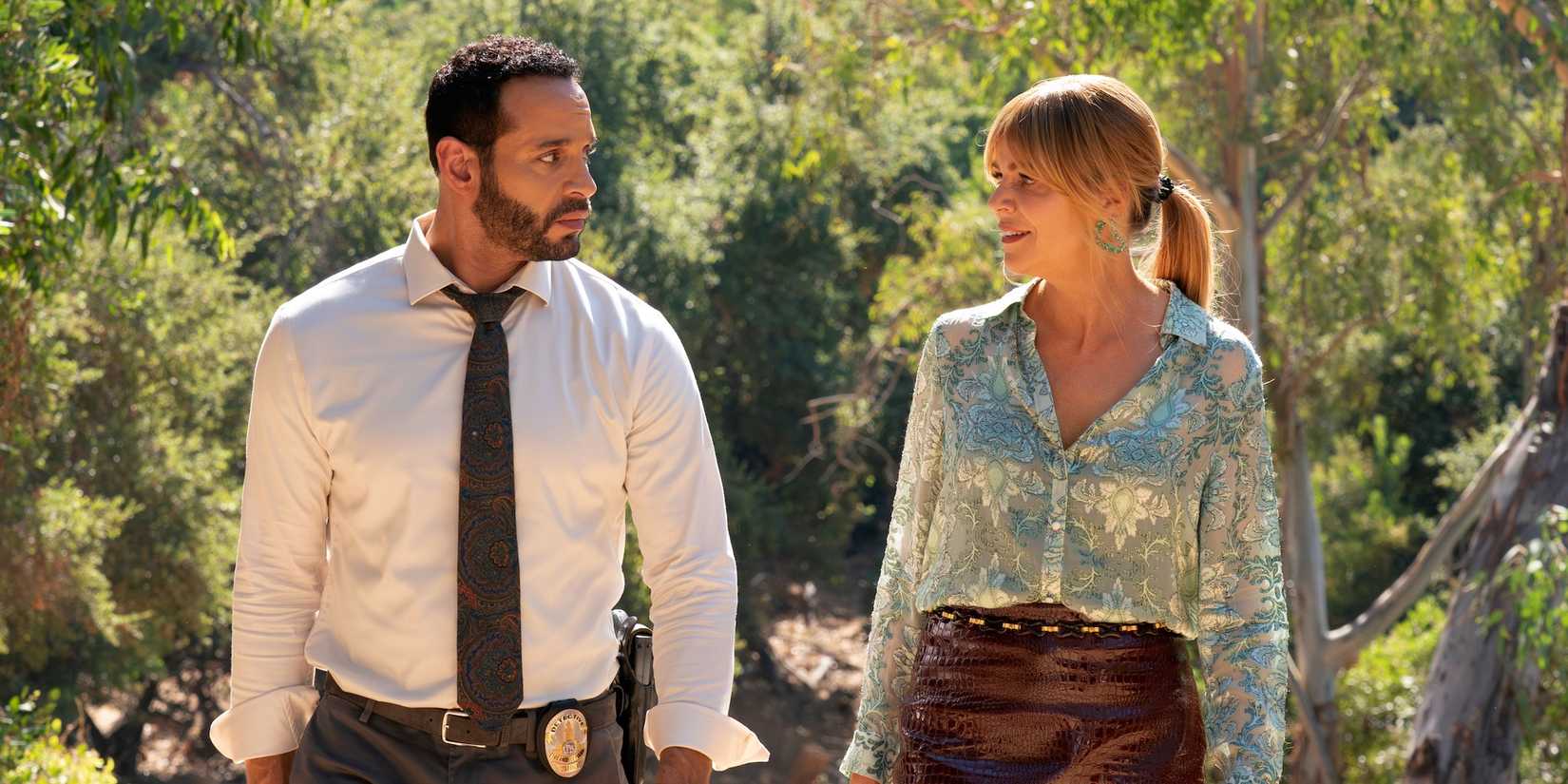 Karadec (Daniel Sunjata) and Morgan (Kaitlin Olson) walking together in High Potential.