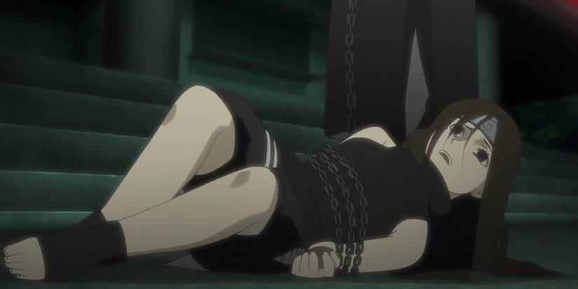 Izumi after being captured by Obito, unable to move due to the chains.