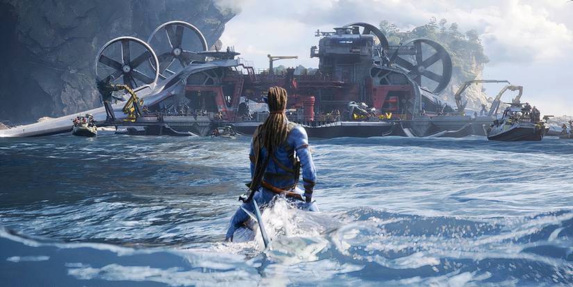 Jake Sully looks at a SeaDragon in Avatar The Way of Water