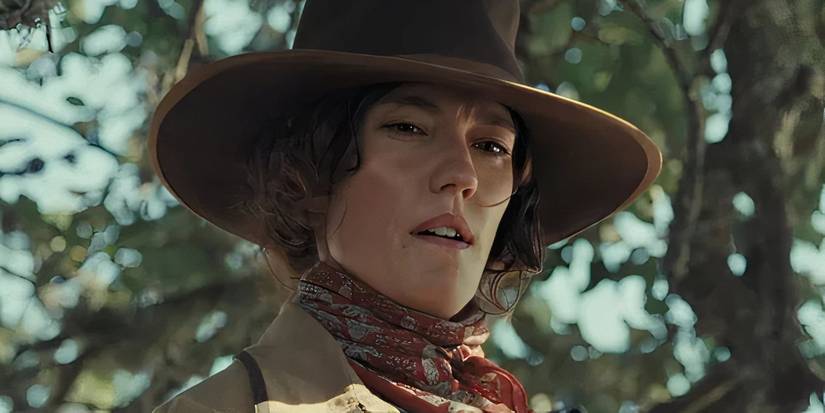 Jennifer Carpenter as Marnie Fossett with a gun in 1923