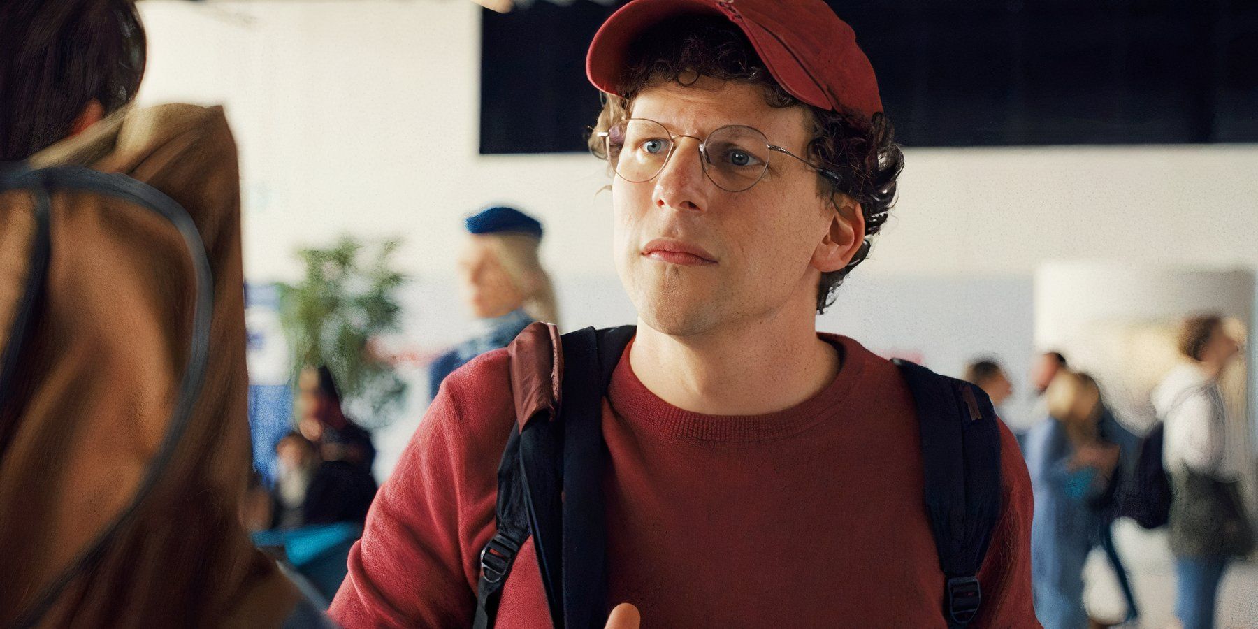 Jesse Eisenberg looking at Kieran Culkin in A Real Pain