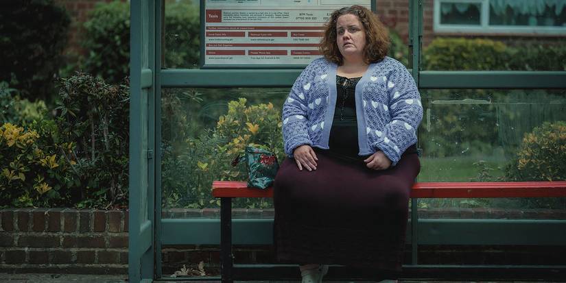 Jessica Gunning as Martha sitting on a park bench in Baby Reindeer