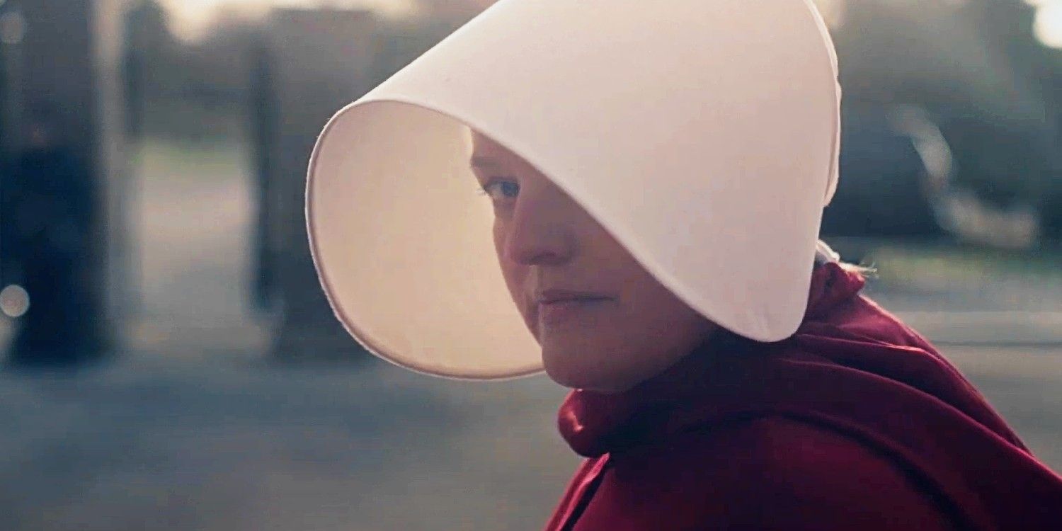 June in her handmaiden garb looking over her shoulder in The Handmaid's Tale season 6