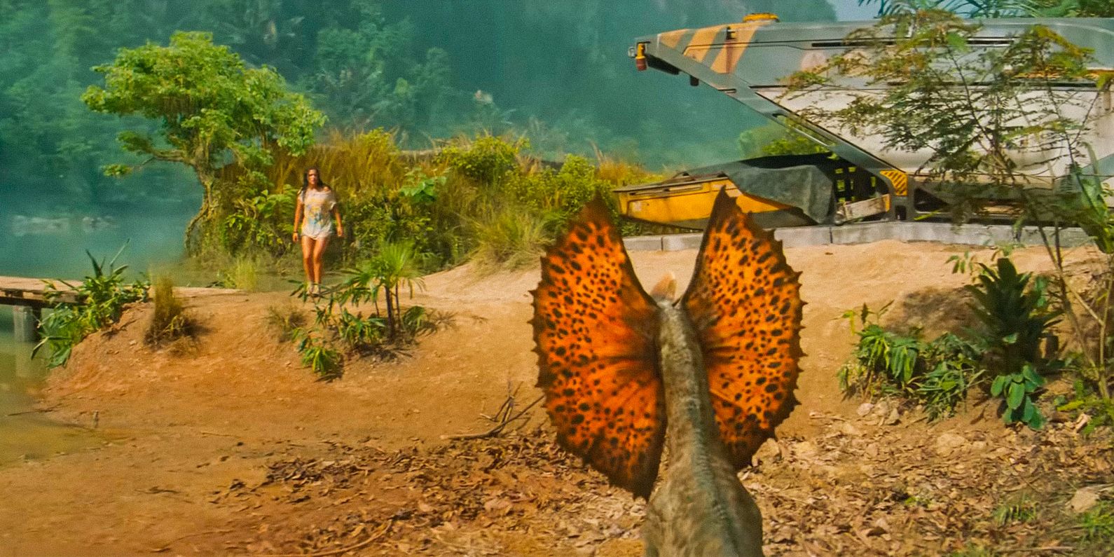 A Dilophosaurus stalking a woman in the distance in Jurassic World Rebirth