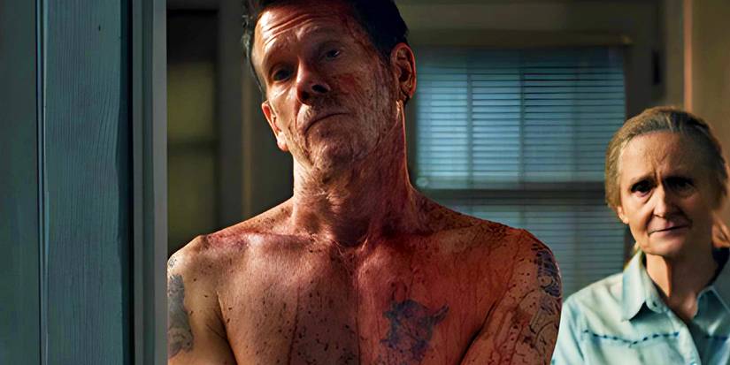 Kevin Bacon shirtless in a doorway in The Bondsman