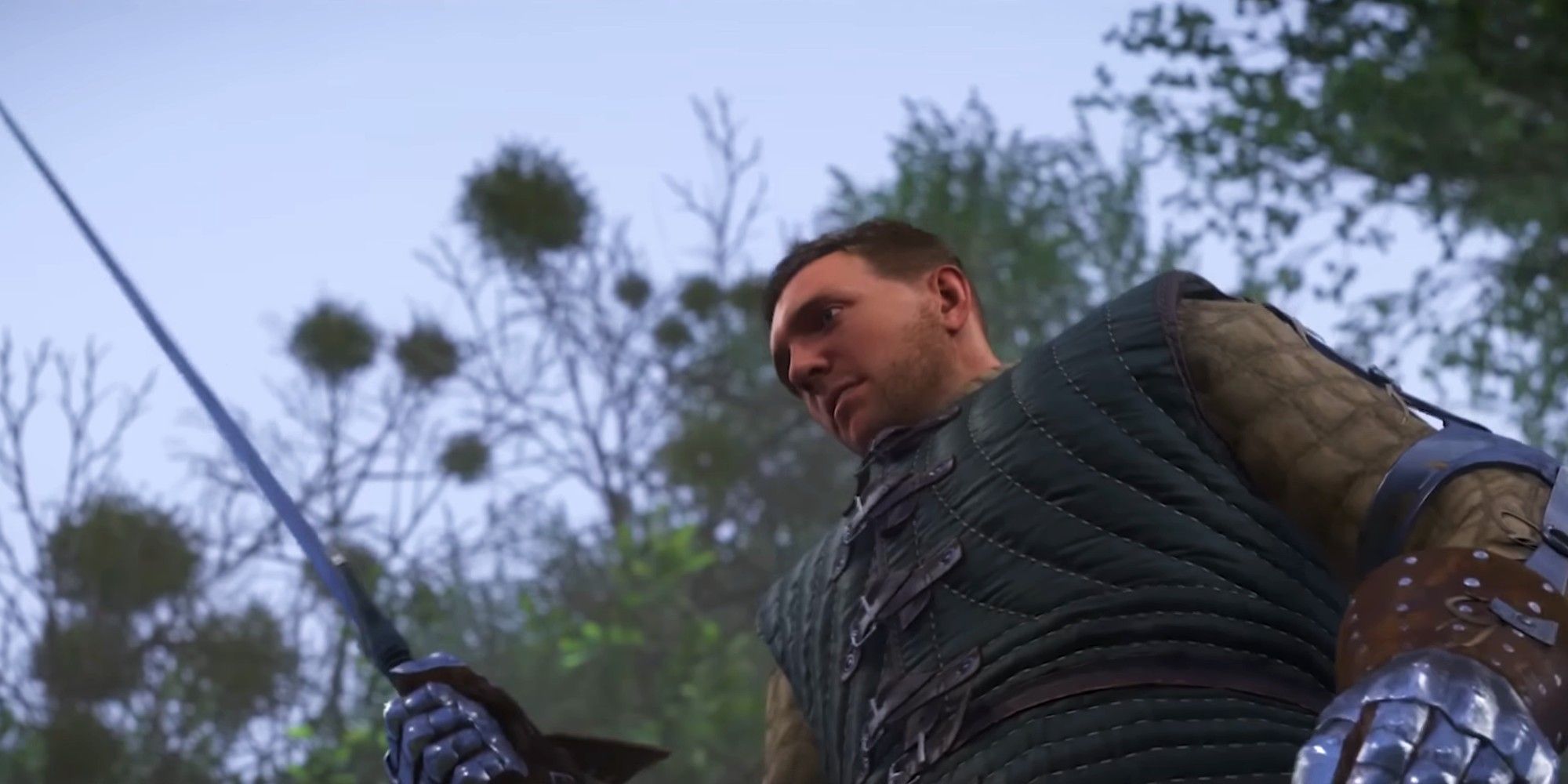 Kingdom Come Deliverance Henry holding a sword and looking at it
