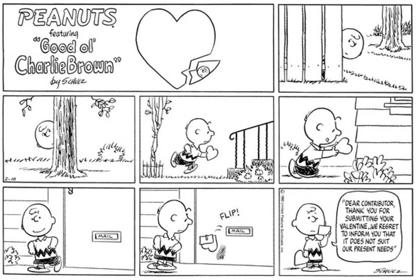 A valentine card coming back from the mail slot put in by Charlie Brown.