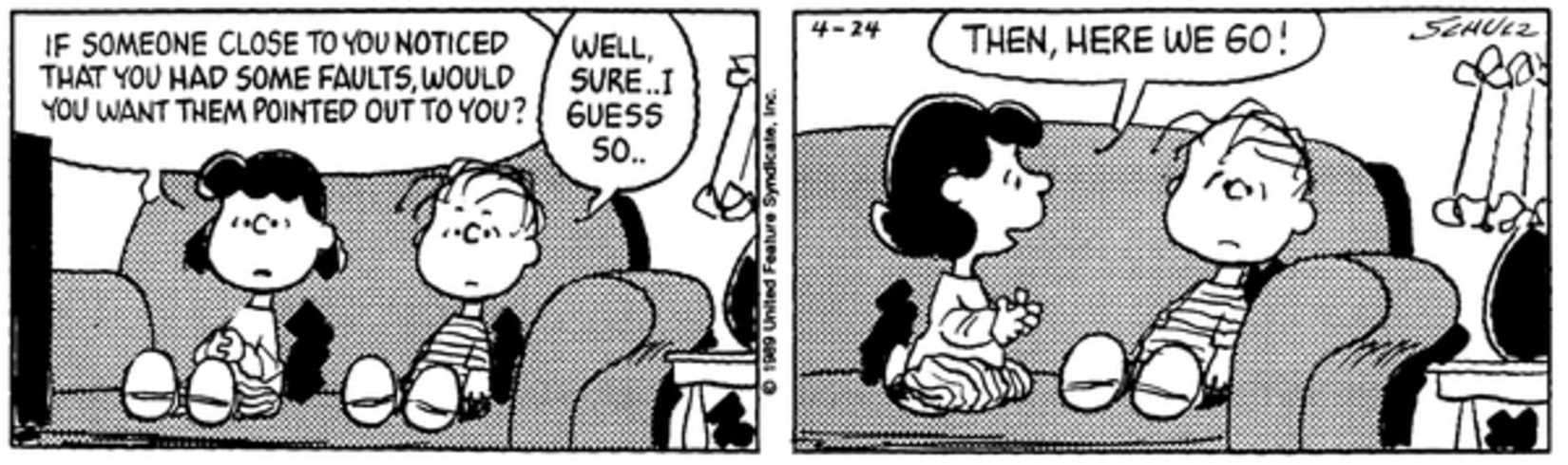 Lucy and Linus sitting on the couch.