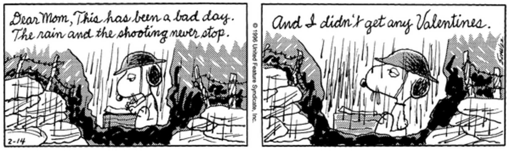 Spike writing a letter in the trenches.