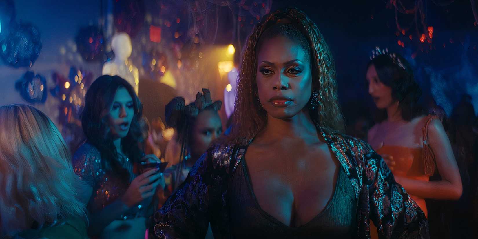 Laverne Cox as Desiree standing in a club in Clean Slate
