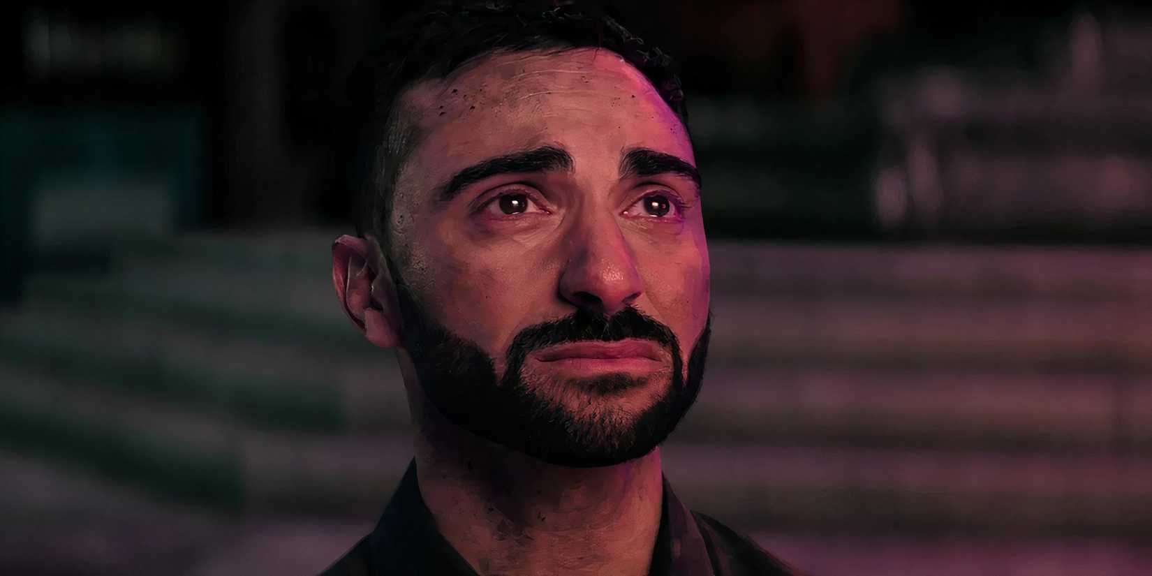 Lee Majdoub's Agent Stone looking tearfully at Dr. Robotnik's farewell message in Sonic the Hedgehog 3