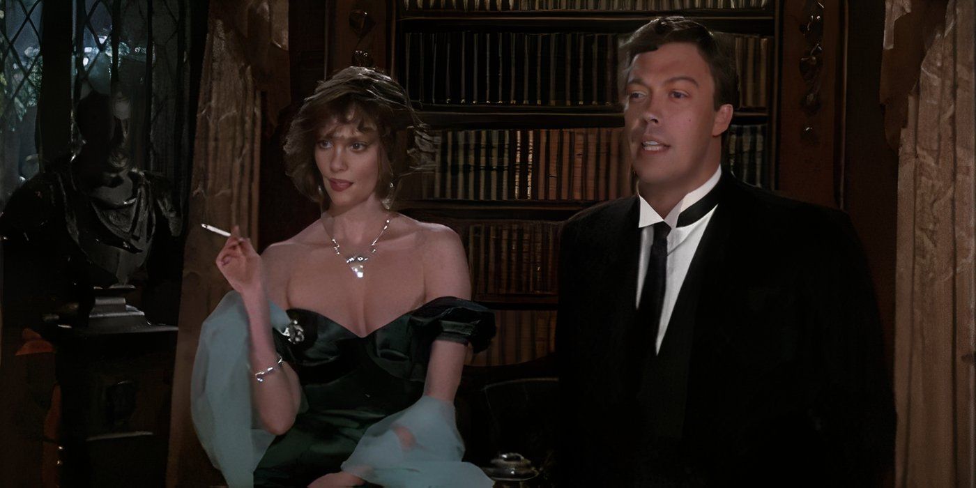 Lesley Ann Warren as Miss. Scarlet sitting by Tim Curry as Wadsworth in Clue