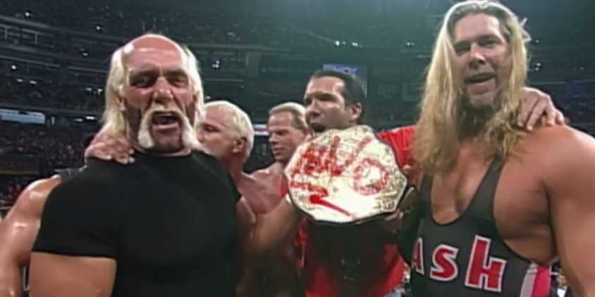 Lex Luger Scott Hall Hollywood Hulk Hogan and Kevin Nash celebrate with the WCW World Heavyweight Championship on Nitro after the Fingerpoke of Doom