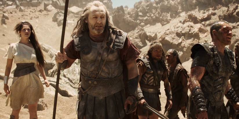Liam Cunningham standing with a crowd of people in Clash of the Titans 2010