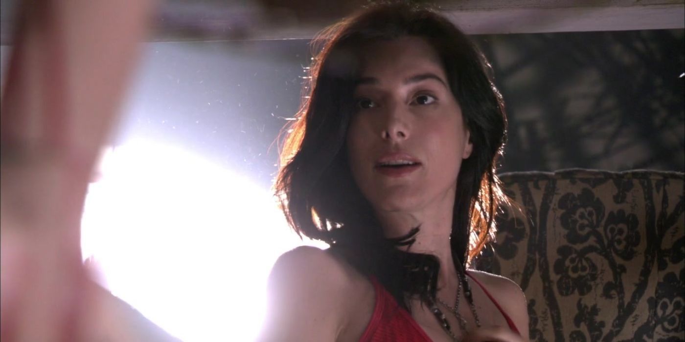 Lila West (Jaime Murray) lovingly looking at Somanone in Dexter.