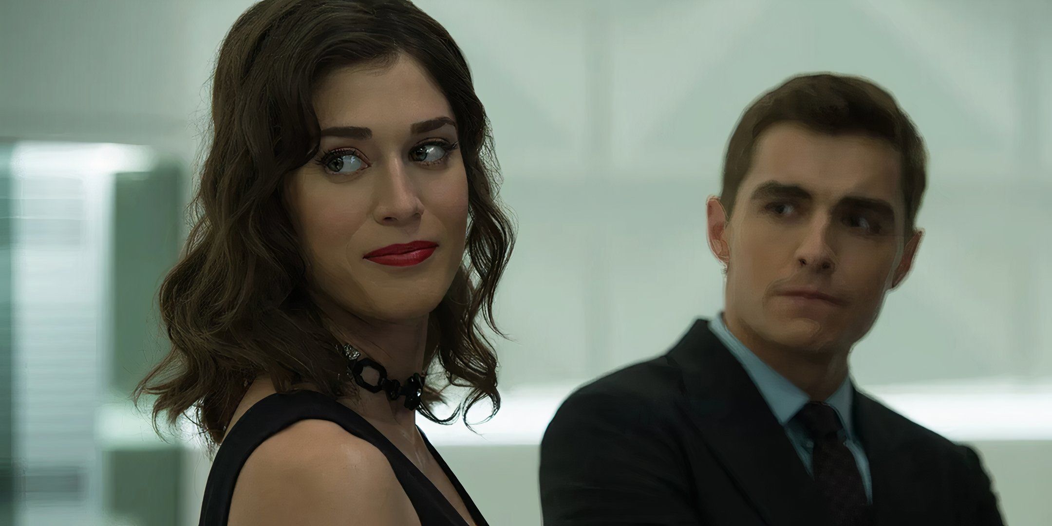 Lizzy Caplan as Lula with Dave Franco's Jack looking at her in the background in Now You See Me 2