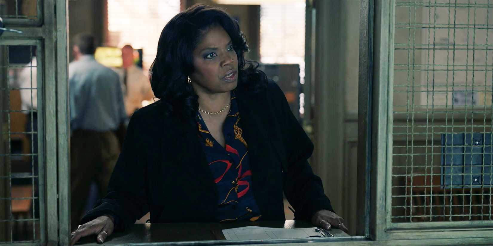 Mary Jo looking through the window in NCIS Origins