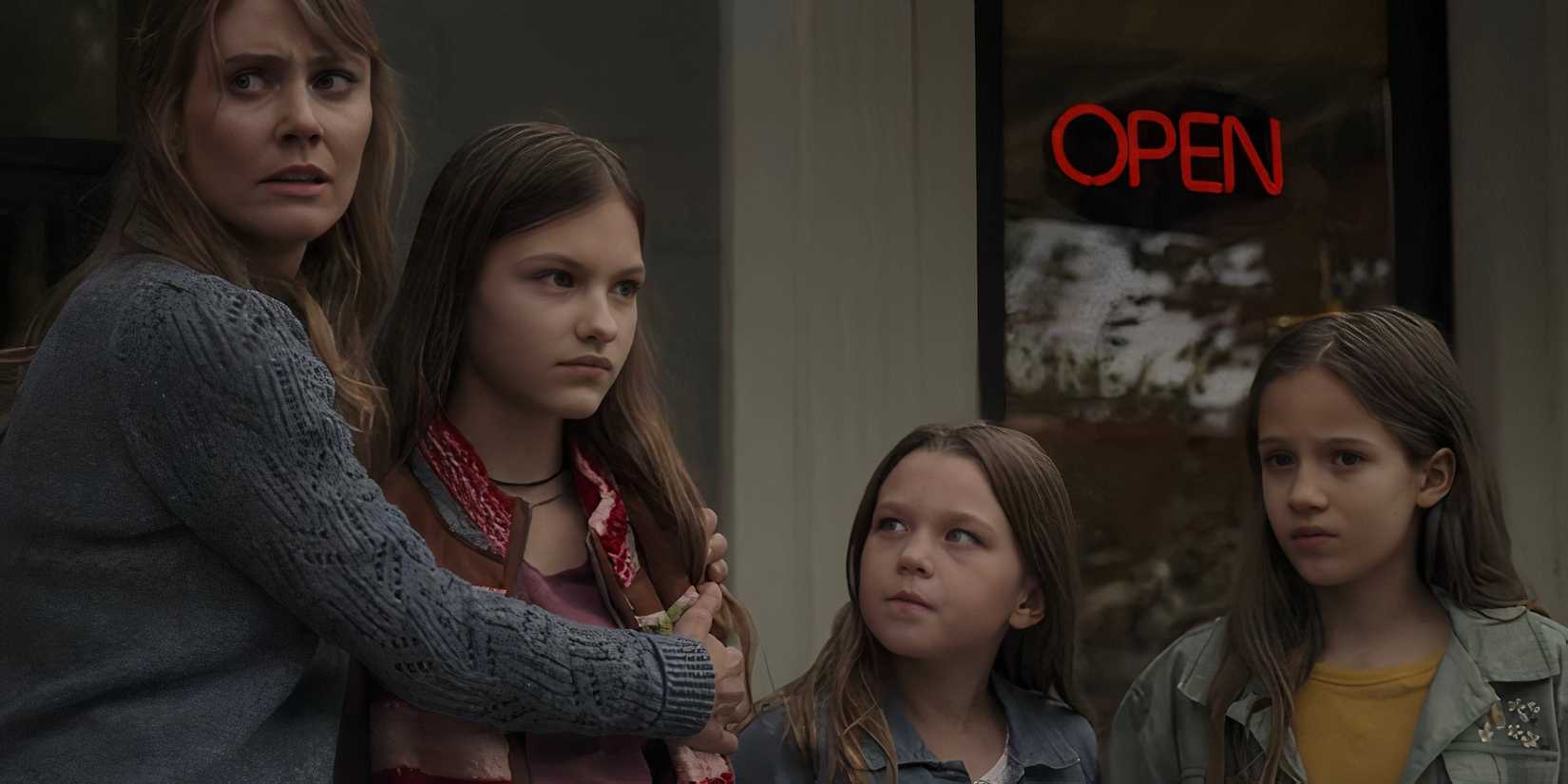 Marybeth standing with her daughters and April in Joe Pickett