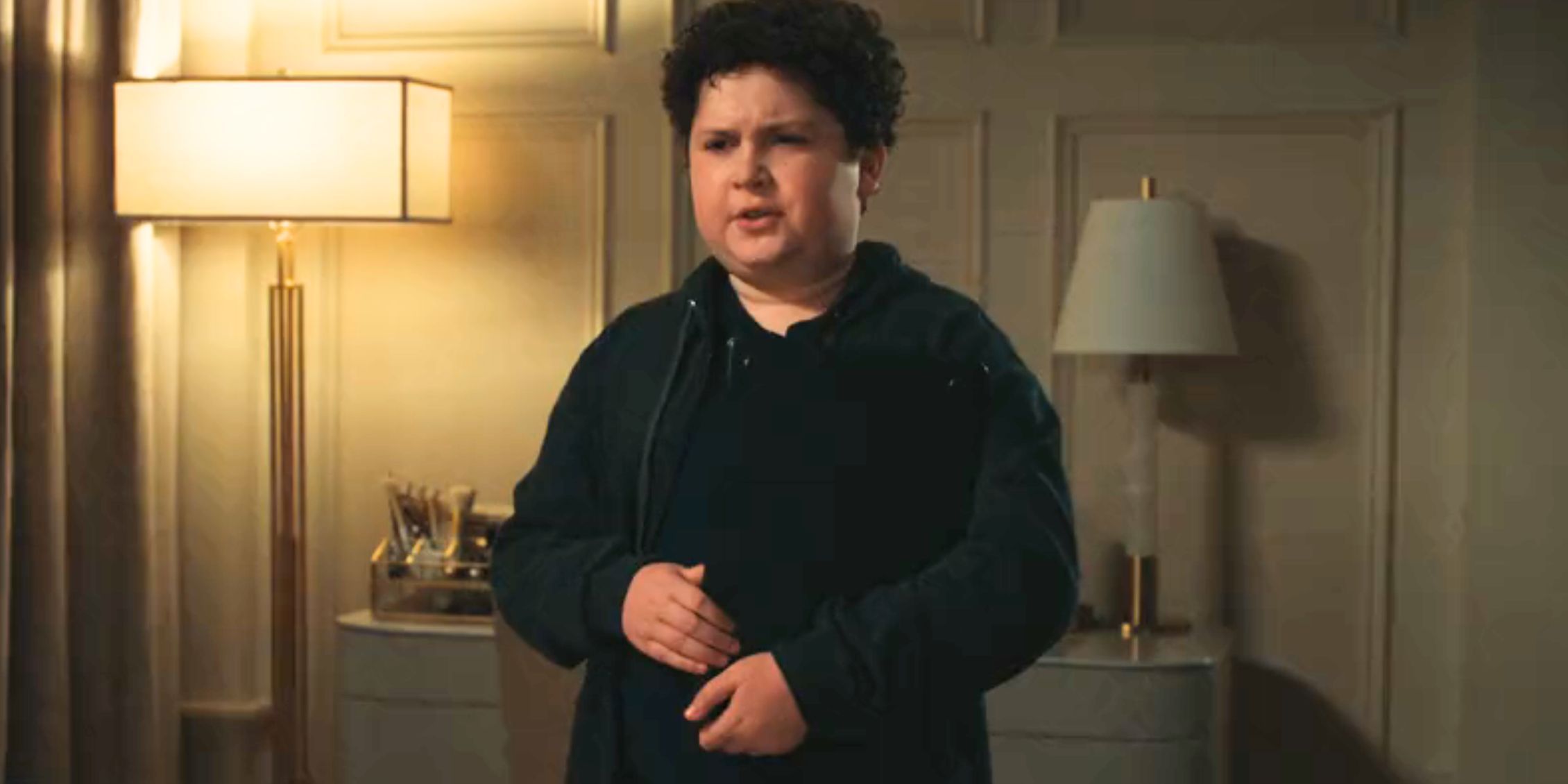 Matlock Alfie standing in Madeline&rsquo;s room wearing a sweatshirt