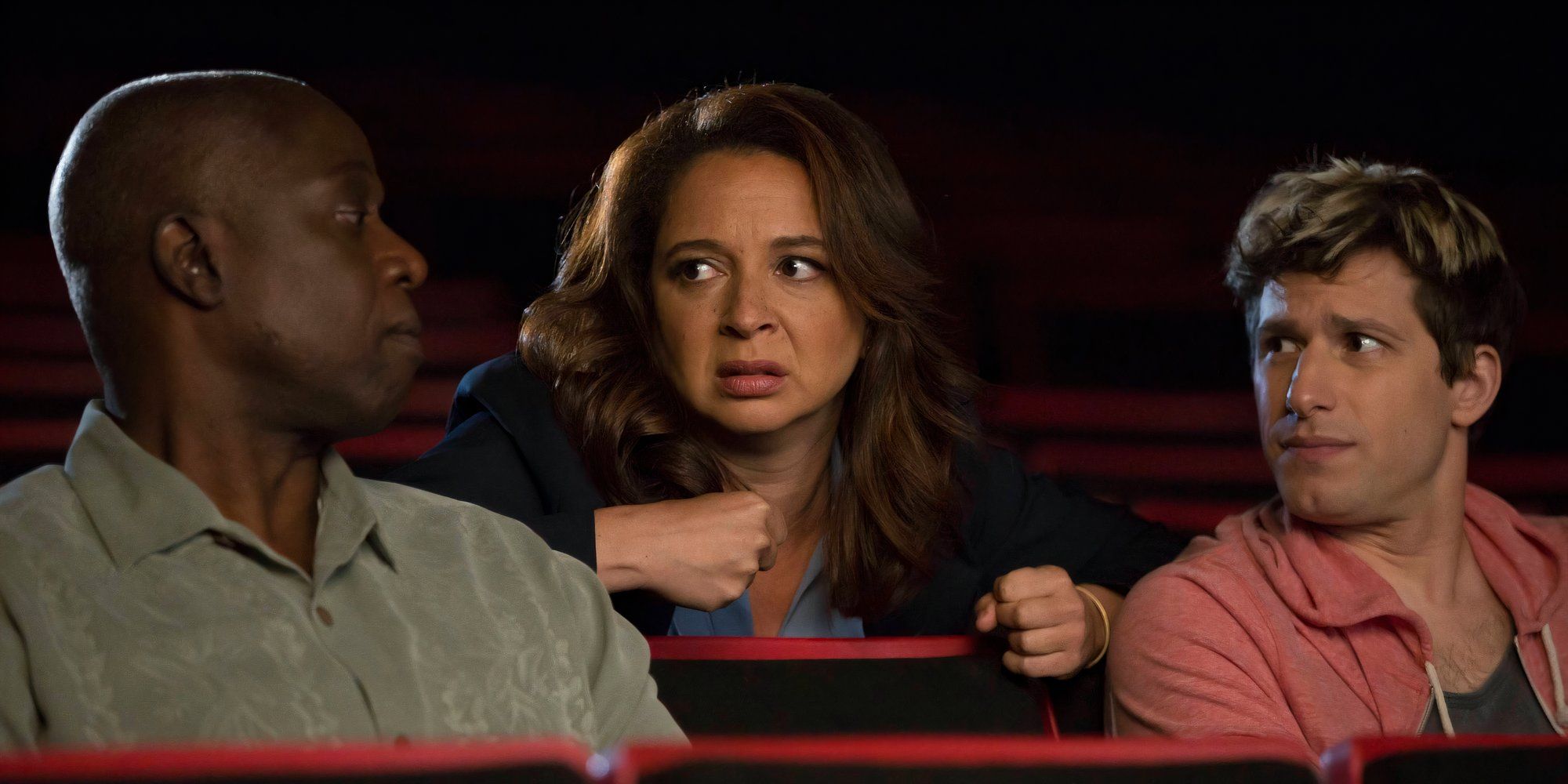 Maya Rudolph behind Andre Braugher and Andy Samberg in a Brooklyn Nine Theater