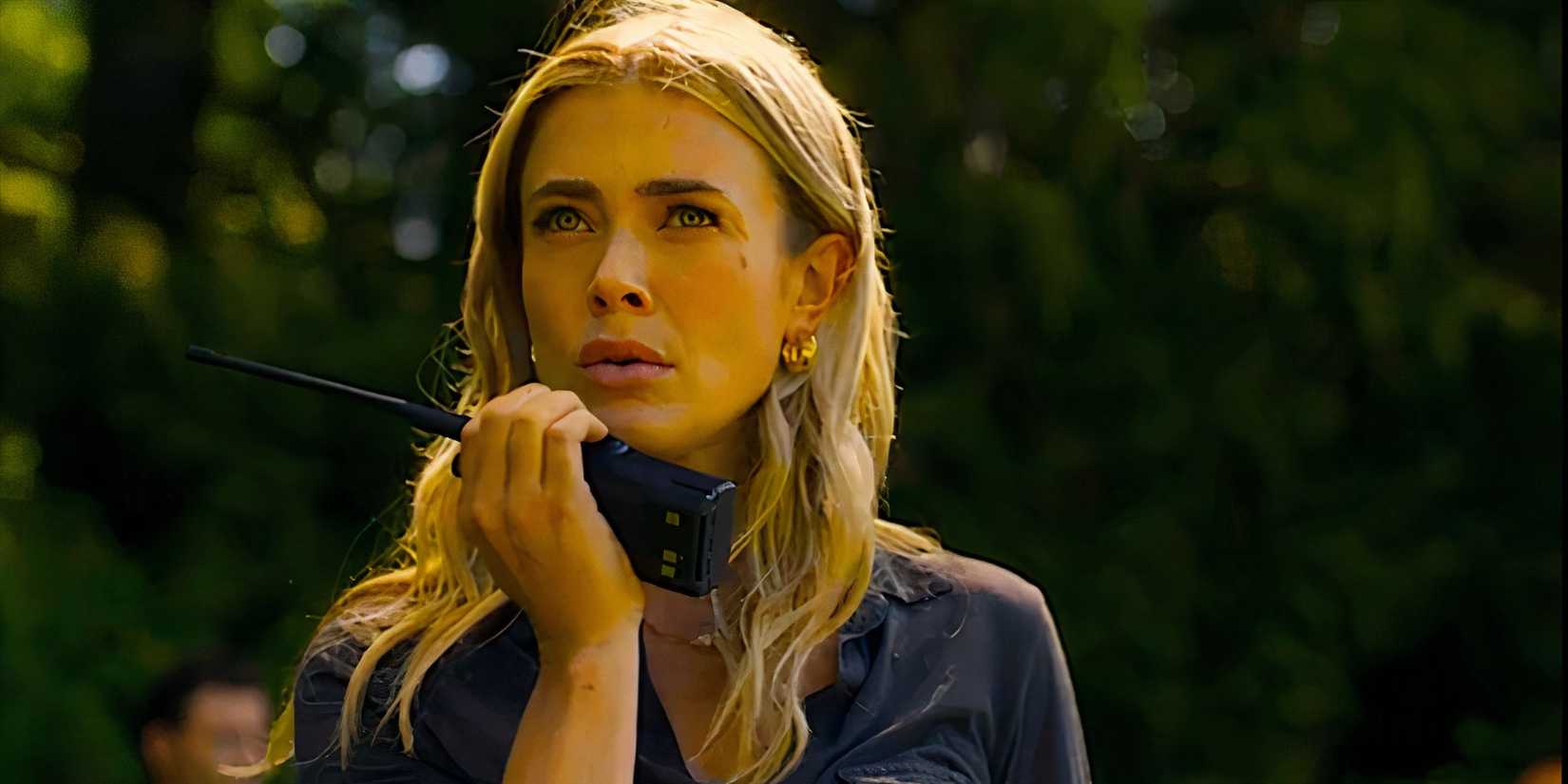 Melissa Roxburgh talking into a walkie in The Hunting Party
