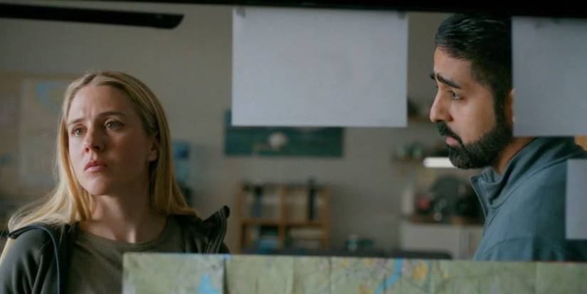 Hanna and Daniel looking at a case board in The Åre Murders