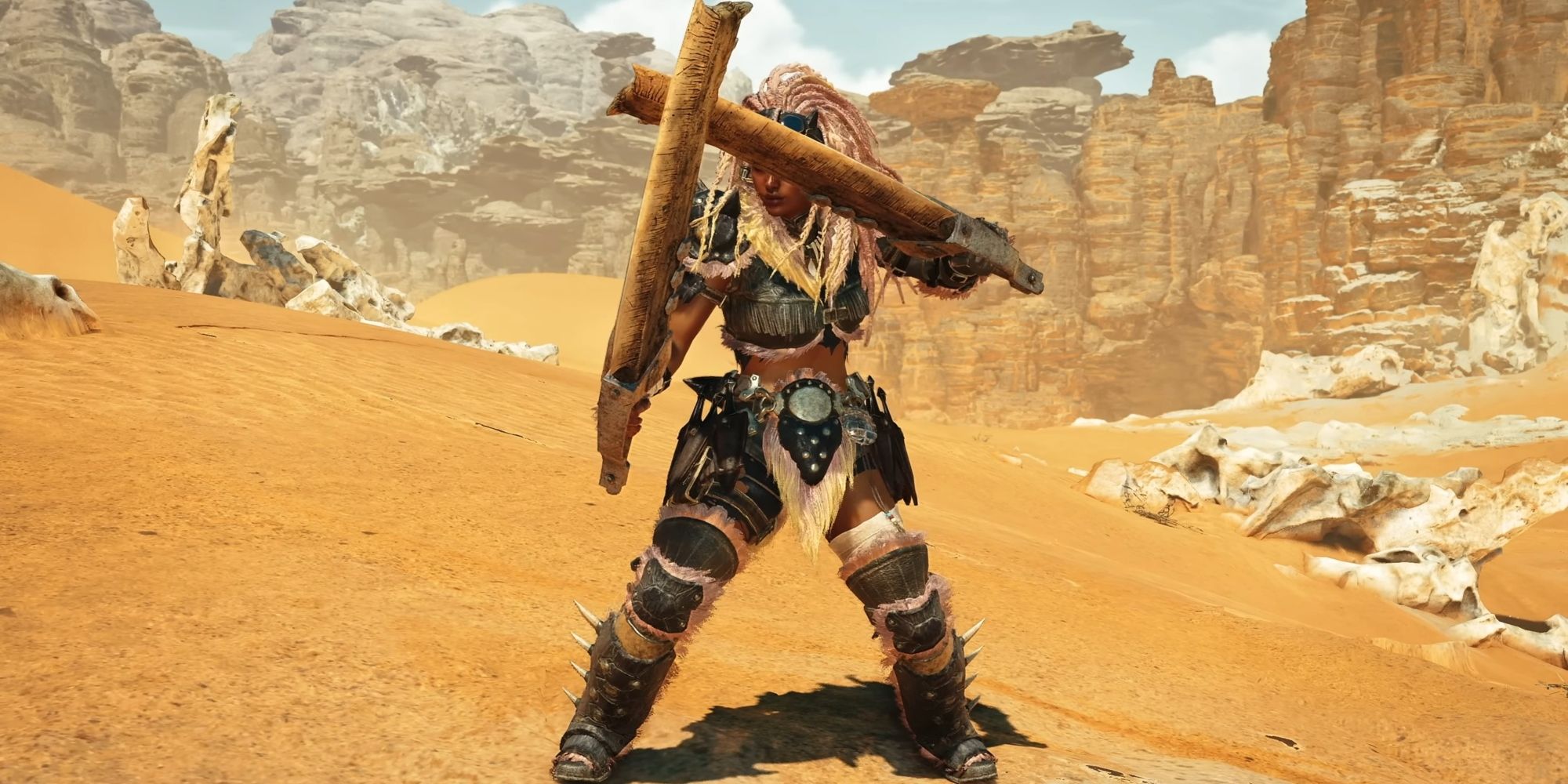 A hunter from Monster Hunter Wilds wields Dual Blades.