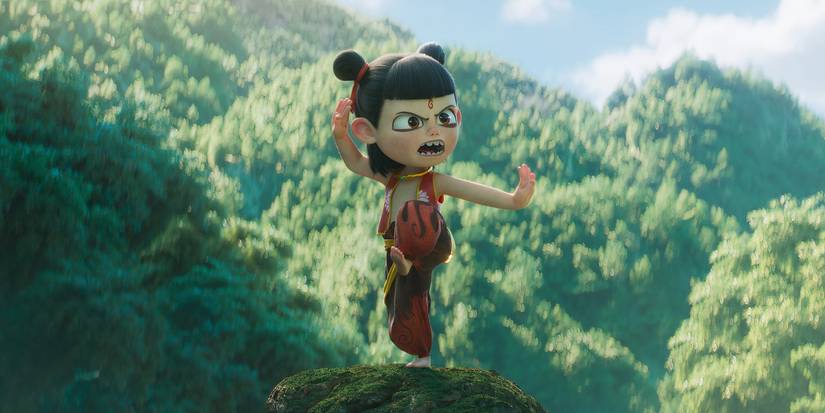 Ne Zha standing on a cliff in the film Ne Zha 2