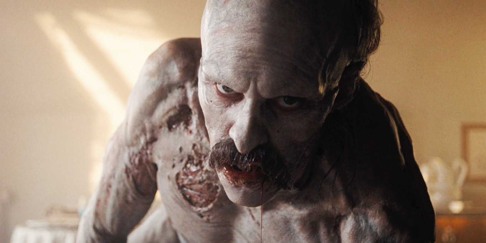 Count Orlok (Bill Skarsgård) looking at Ellen (Lily-Rose Depp) in daylight in Nosferatu 2024.