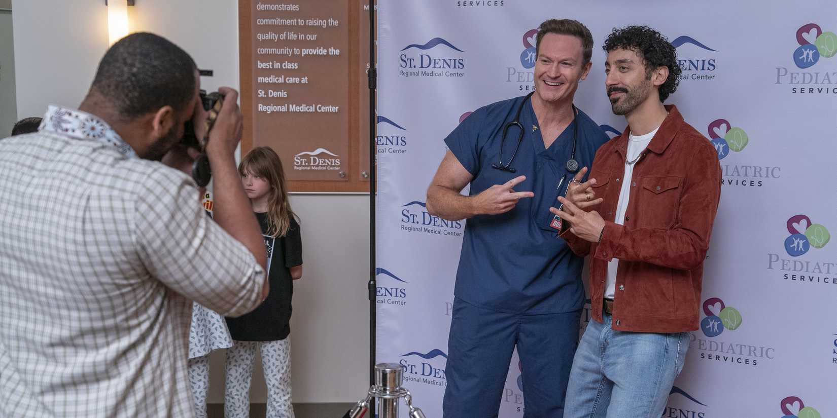 Josh Lawson as Bruce and Morgan Jay as Colby Twill in St. Denis Medical season 1, episode 13