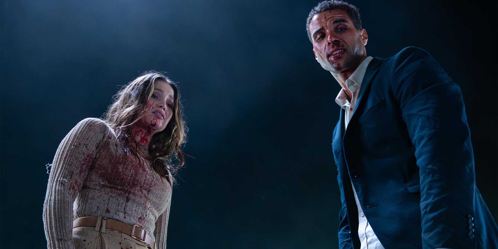 Olivia Holt and Mason Gooding covered in blood during Heart Eyes